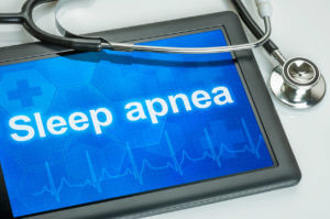 Tablet with the diagnosis Sleep apnea on the display.